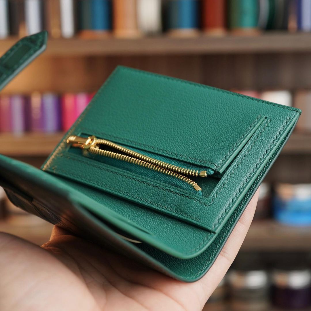 Green wallet with zip coin compartment