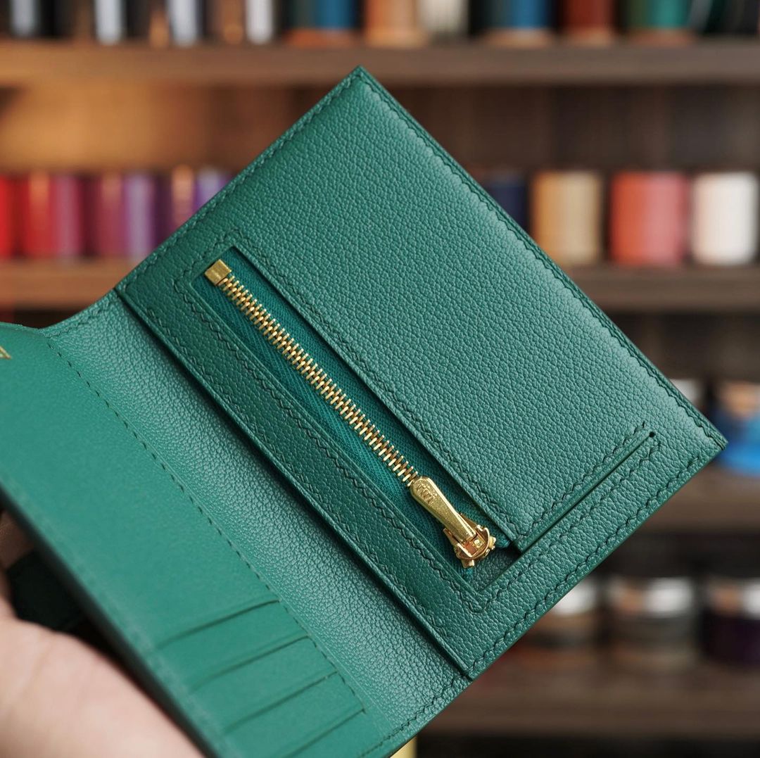 Green wallet with zip coin compartment