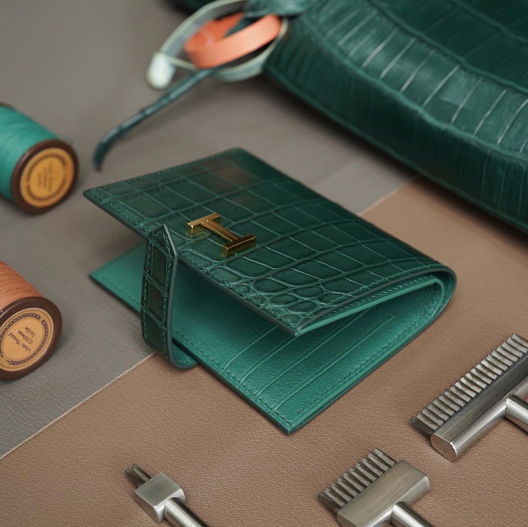 Green wallet with zip coin compartment